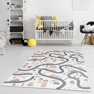Kids room with a Mave Roads Washable Rug. Cream rug features a road and vehicle pattern. White crib and playful decor. Roomscene-Rectangle