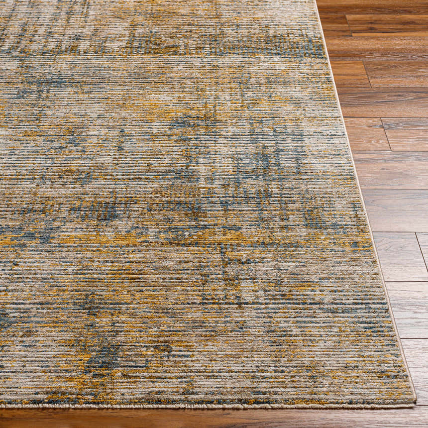 Close-up of the Osma Rich Textured Traditional Rug with bone, driftwood, multi brown, taupe, and walnut colors. Front