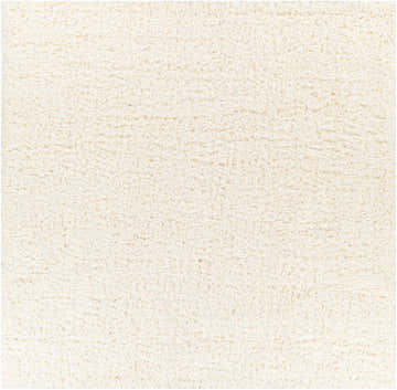 Close-up of the Siari Solid Cream Plush Rug, showing its soft texture and shag pile. Design-Square-710