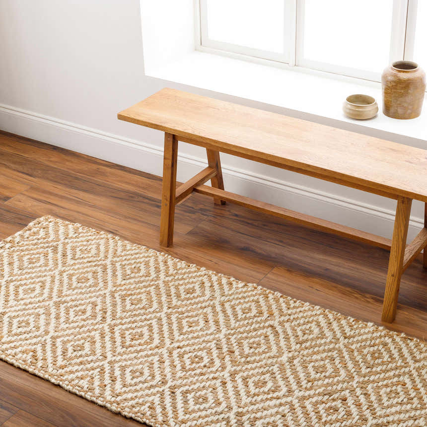 Entryway scene with Eriko Area Rug, a jute runner with geometric diamond pattern, wood bench, and natural light. Roomscene-Runner
