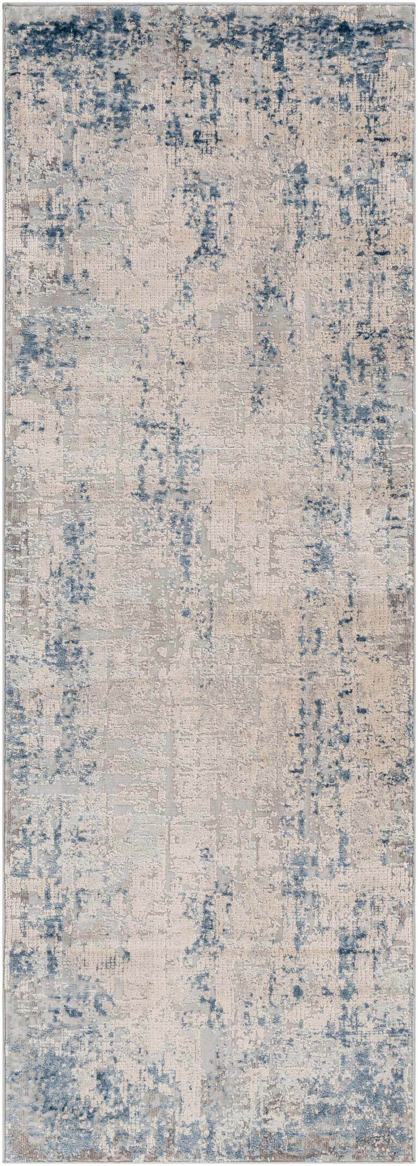 Close-up of the Saltair Textured Luxe Rug. Features a contemporary design in blue, gray, and off-white hues. Design-Runner-2773