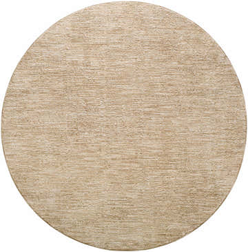 Close-up of a round Kahua Tan Area Rug. The rug has a subtle, textured pattern in neutral tan tones. Design-Round-67