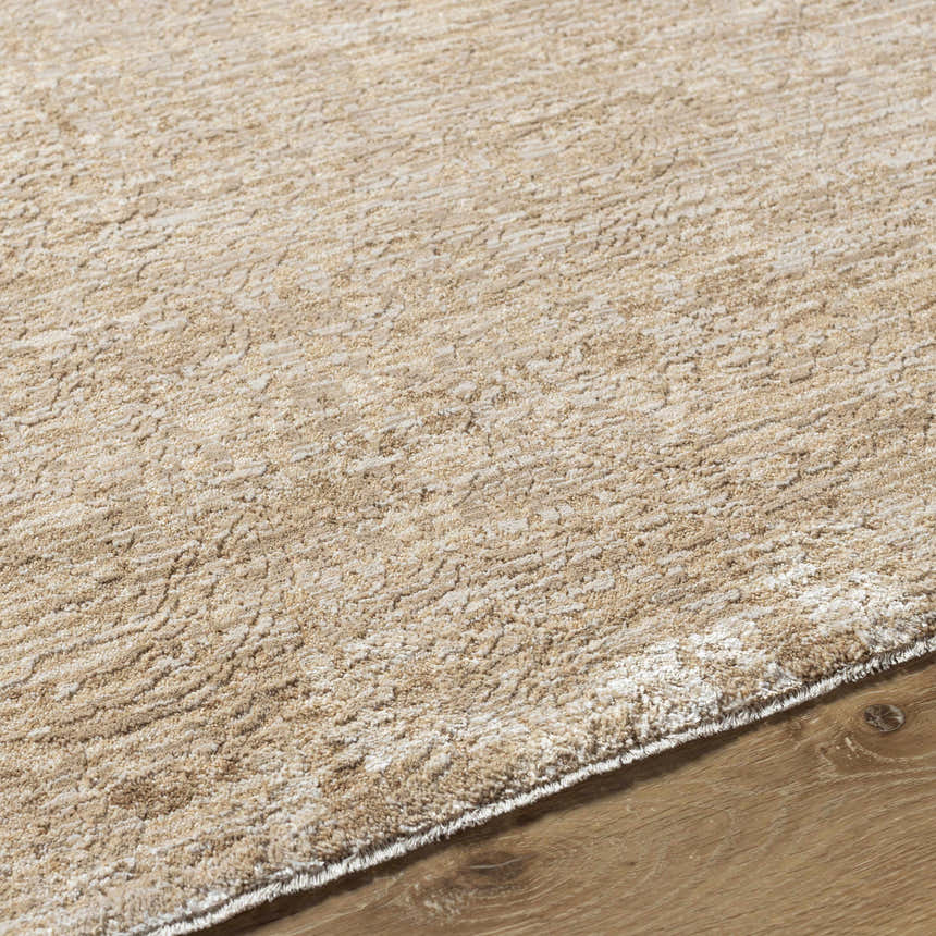 Close-up of the Katia Tan Area Rug showing its khaki and tan textured pattern and machine woven construction. Texture