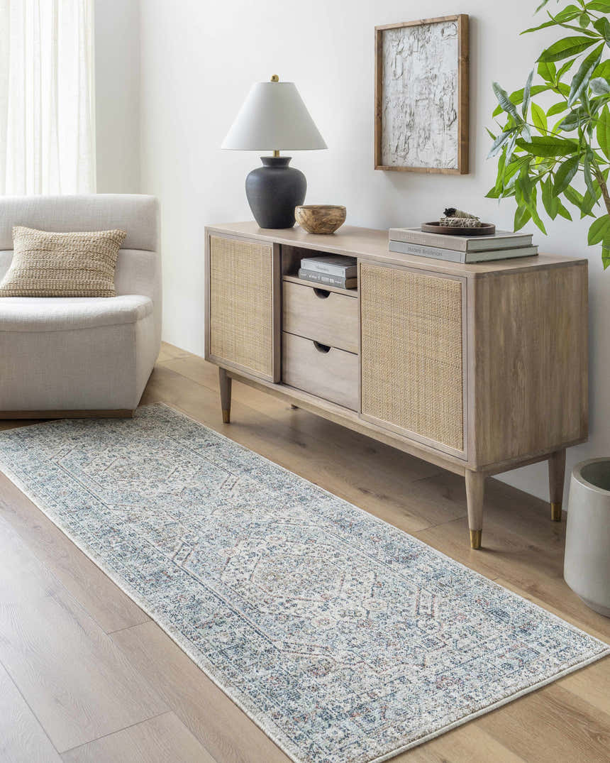 Living room scene with a Kalei Beige & Blue Area Rug runner, light wood floors, and a console table with decor. Roomscene-Runner