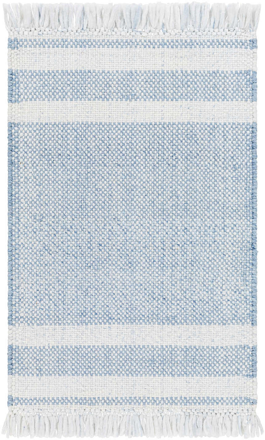 Close-up of the Loic Silver Blue Area Rug, featuring a striped pattern and white fringe. Hand-woven texture. Design-Rectangle-23