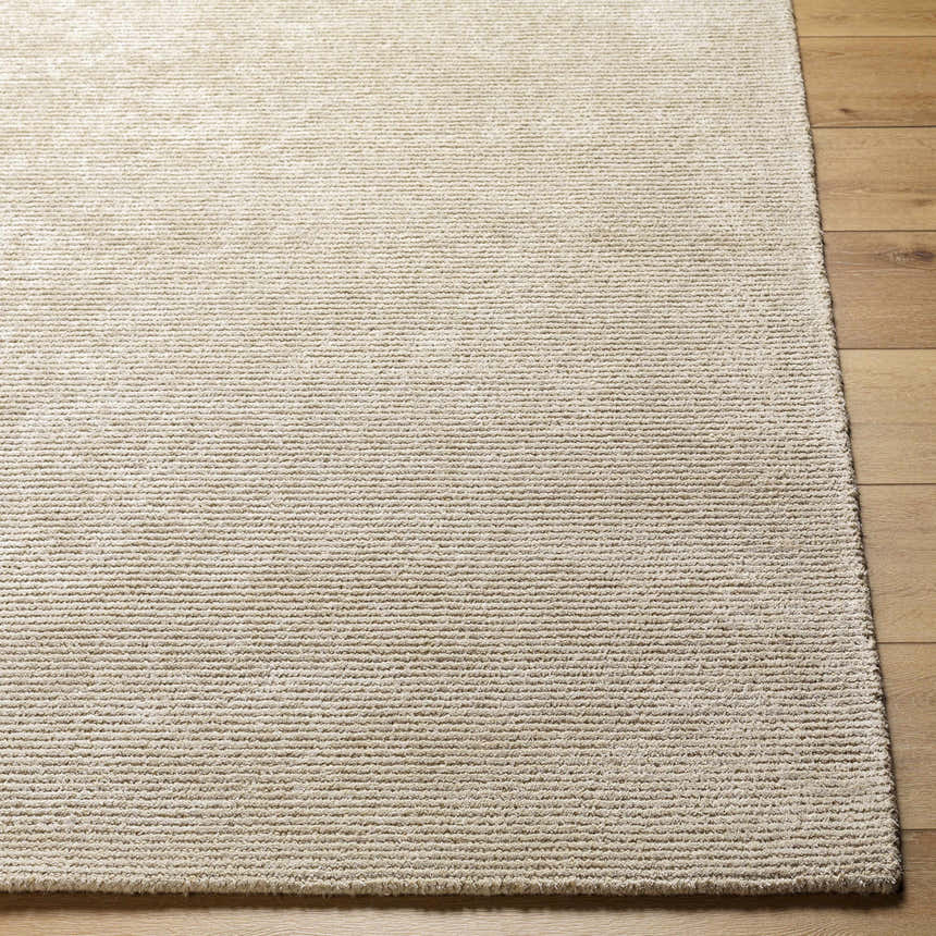 Close-up of a Pirro Premium Wool Blend Rug in ash. Hand-tufted, contemporary style with subtle texture. Front