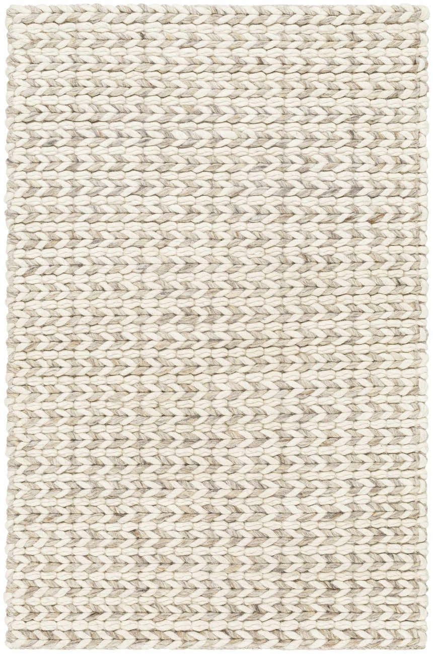 Close-up of the Lenci Antique Beige Area Rug. Hand-woven wool and cotton rug with a chunky, textured weave in beige and bone. Design-Rectangle-23