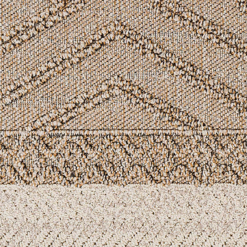 Close-up of Beige Areli Area Rug. Shows texture and geometric pattern in beige, mustard, and black. Swatch