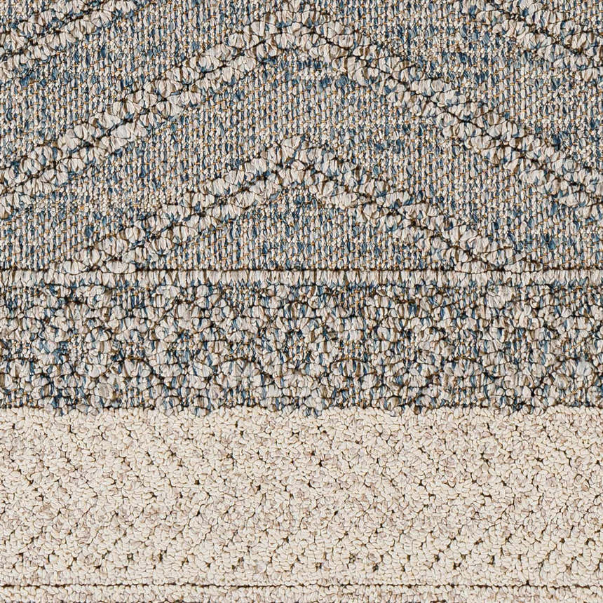 Close-up of the Blue Areli Area Rug showing geometric pattern and textured weave in blue, tan, and taupe. Swatch