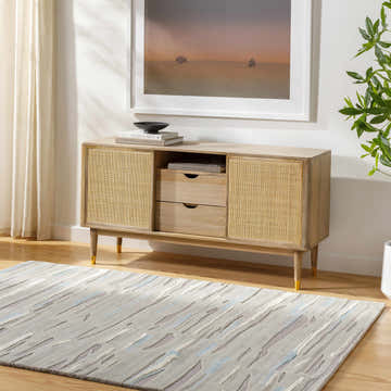Living room scene with a gray Atius Area Rug featuring a contemporary stripe design. Roomscene-Rectangle