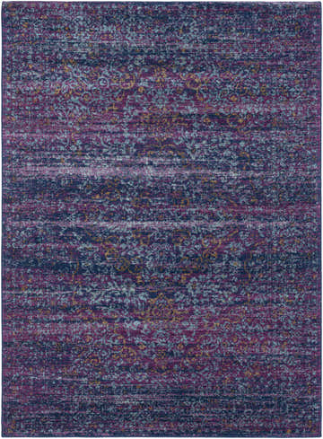 Close-up of the Stonewall Area Rug, a machine-woven rug with a vintage-inspired design in burgundy, navy, teal, and burnt orange. Design-Rectangle-5373