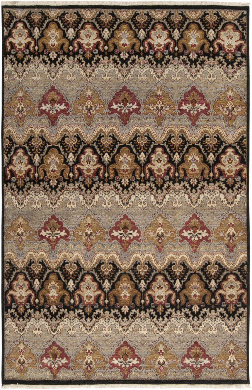 Close-up of the Stoutsville Carpet, a hand-knotted rug with a traditional design in amber, black, red, and gray wool. Design-Rectangle-5686