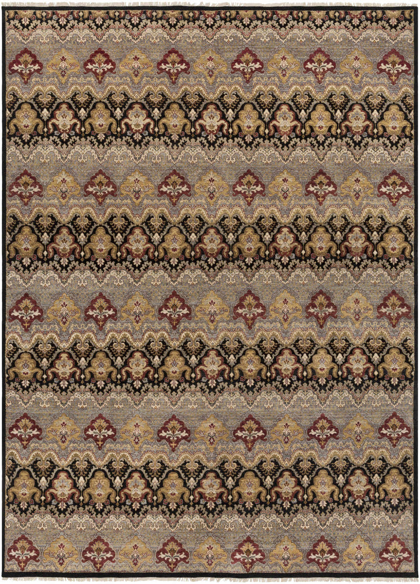 Detailed view of the Stoutsville Carpet. Hand knotted wool rug with amber, black, red, and gray traditional patterns. Design-Rectangle