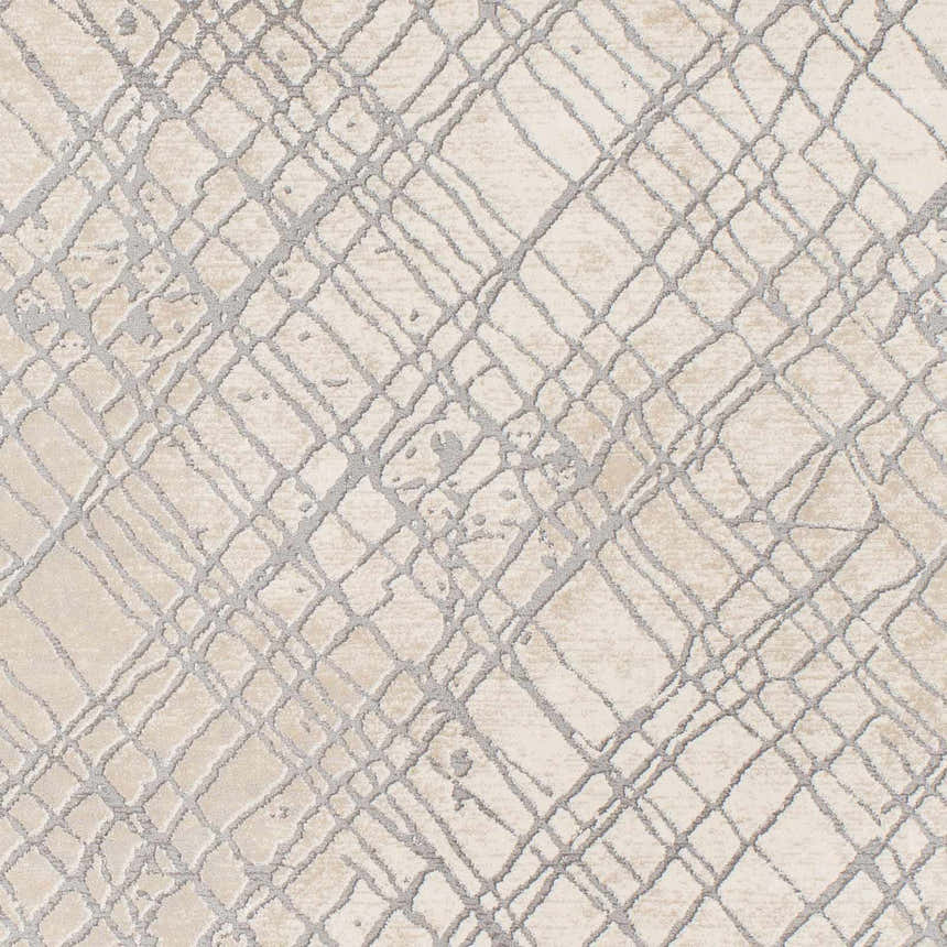Close-up of the Strykersville Area Rug. Beige rug with a charcoal gray geometric line pattern. Contemporary style. Swatch