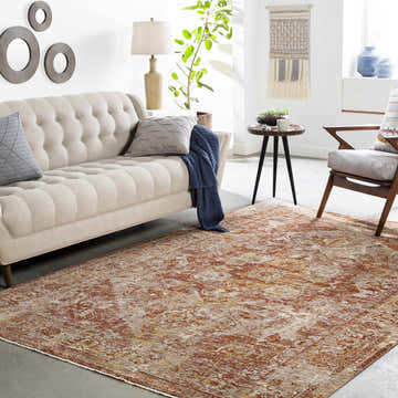 Living room with a Strathbogie Traditional Red Area Rug, beige sofa, and mid-century modern chair. Earthy, warm tones. Roomscene-Rectangle