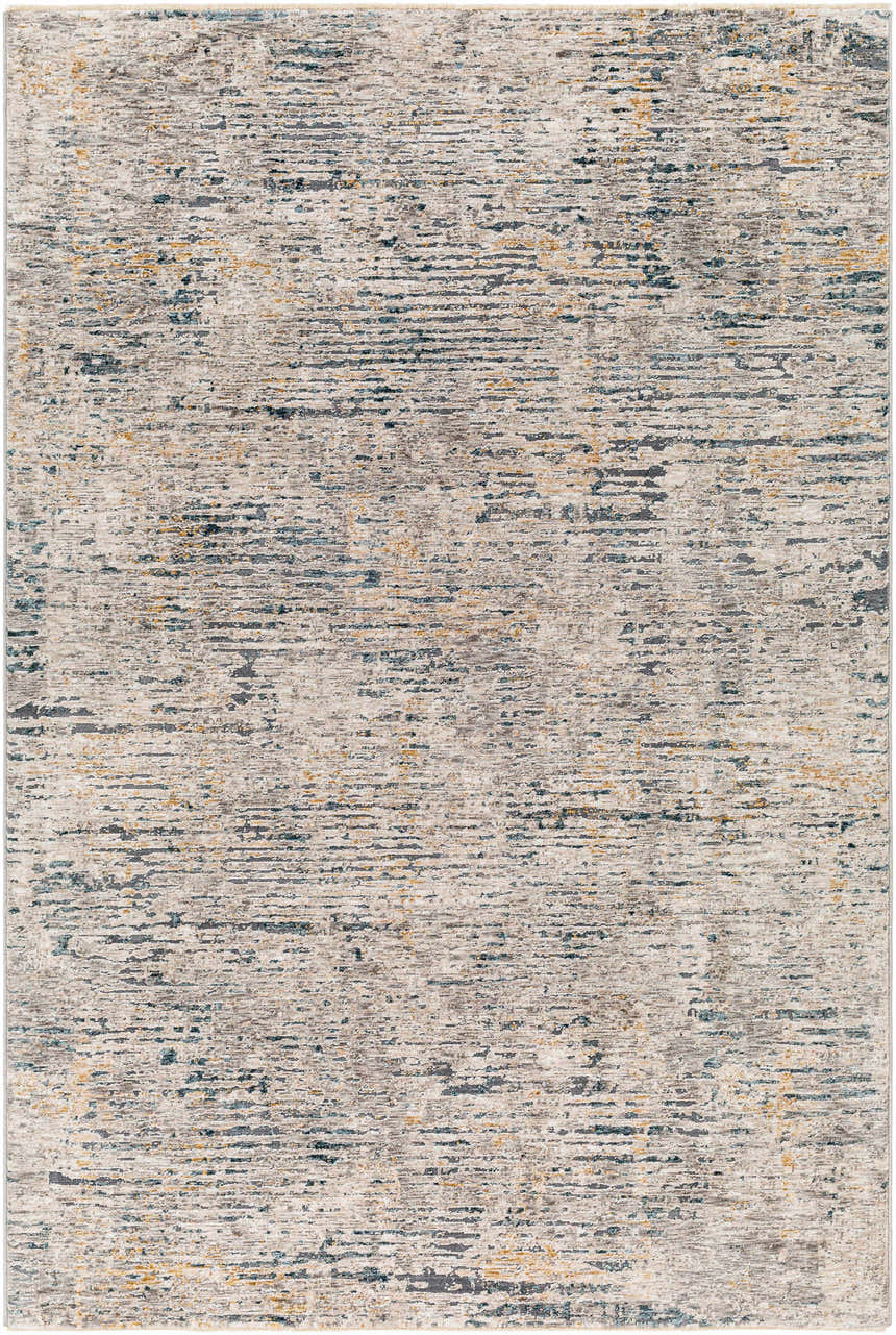 Close-up of the Sywell Luxe Fringe Rug. Beige, blue, and charcoal distressed contemporary pattern. Design-Rectangle-575