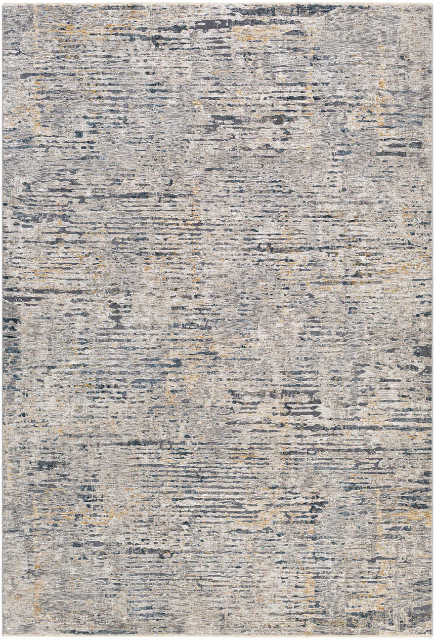 Close-up of the Sywell Luxe Fringe Rug. Contemporary design in beige, blue, charcoal, and tan hues. Machine woven texture. Design-Rectangle-6796