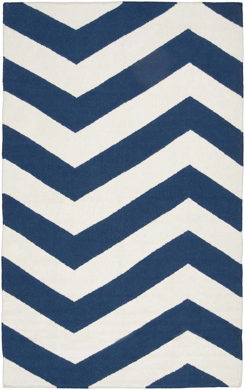 Close-up of the hand woven Tamaya Area Rug. Dark blue and white chevron pattern. 100% Wool texture. Design-Rectangle-58
