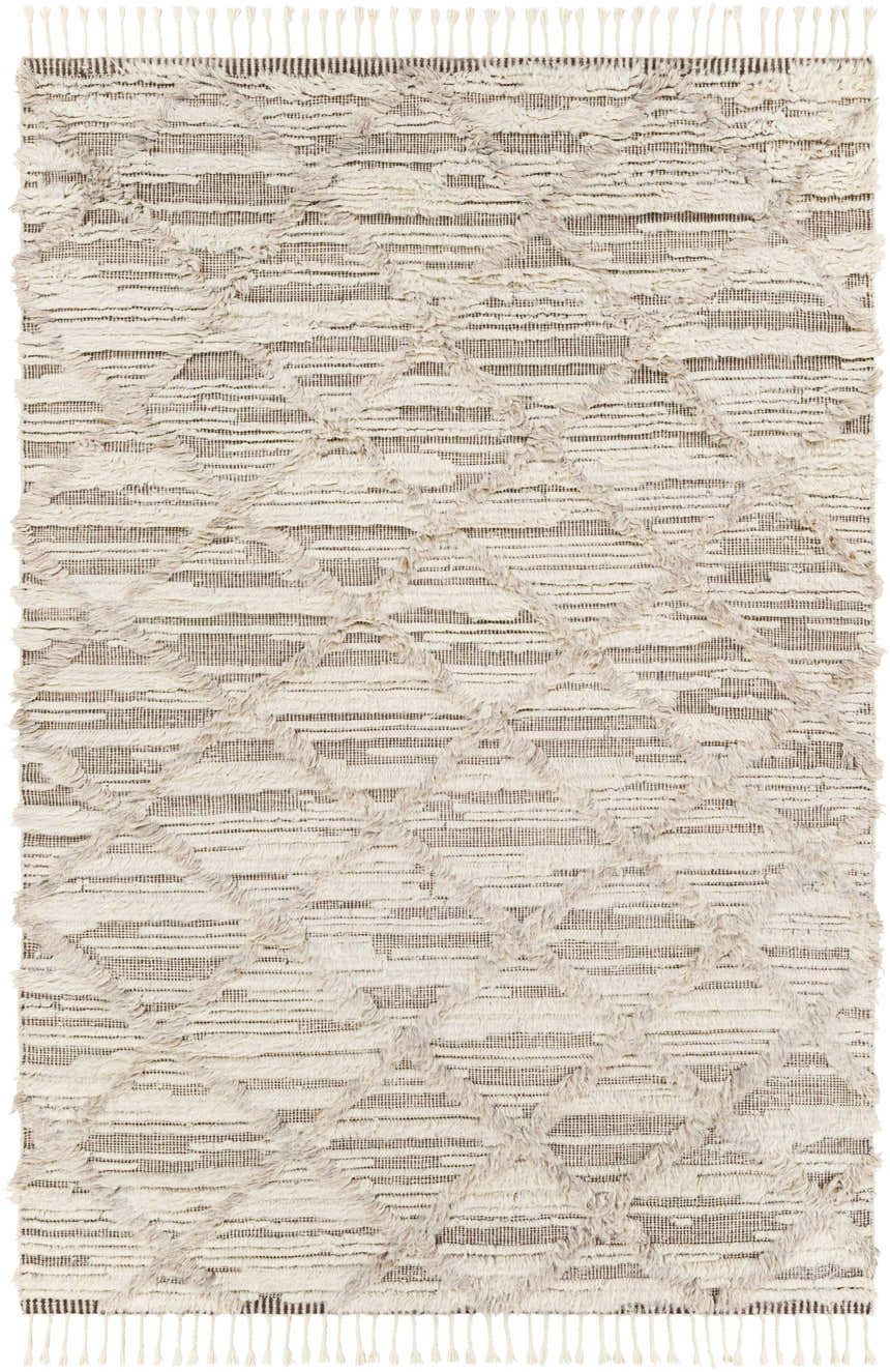 Close-up of the Tankerton Area Rug: a hand-knotted, 100% wool rug in dark brown, light beige, and oatmeal with a geometric pattern and fringe. Design-Rectangle-69