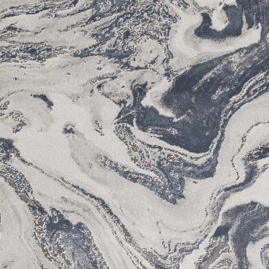 Close-up of the Moana Denim Blue Marble Area Rug, showing a swirling abstract pattern in denim, navy, charcoal, and white. Swatch
