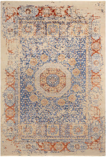 Detailed view of the hand-knotted Timnath Clearance Rug. Contemporary design in cream, blue, and rust colors. Wool rug texture. Design-Rectangle