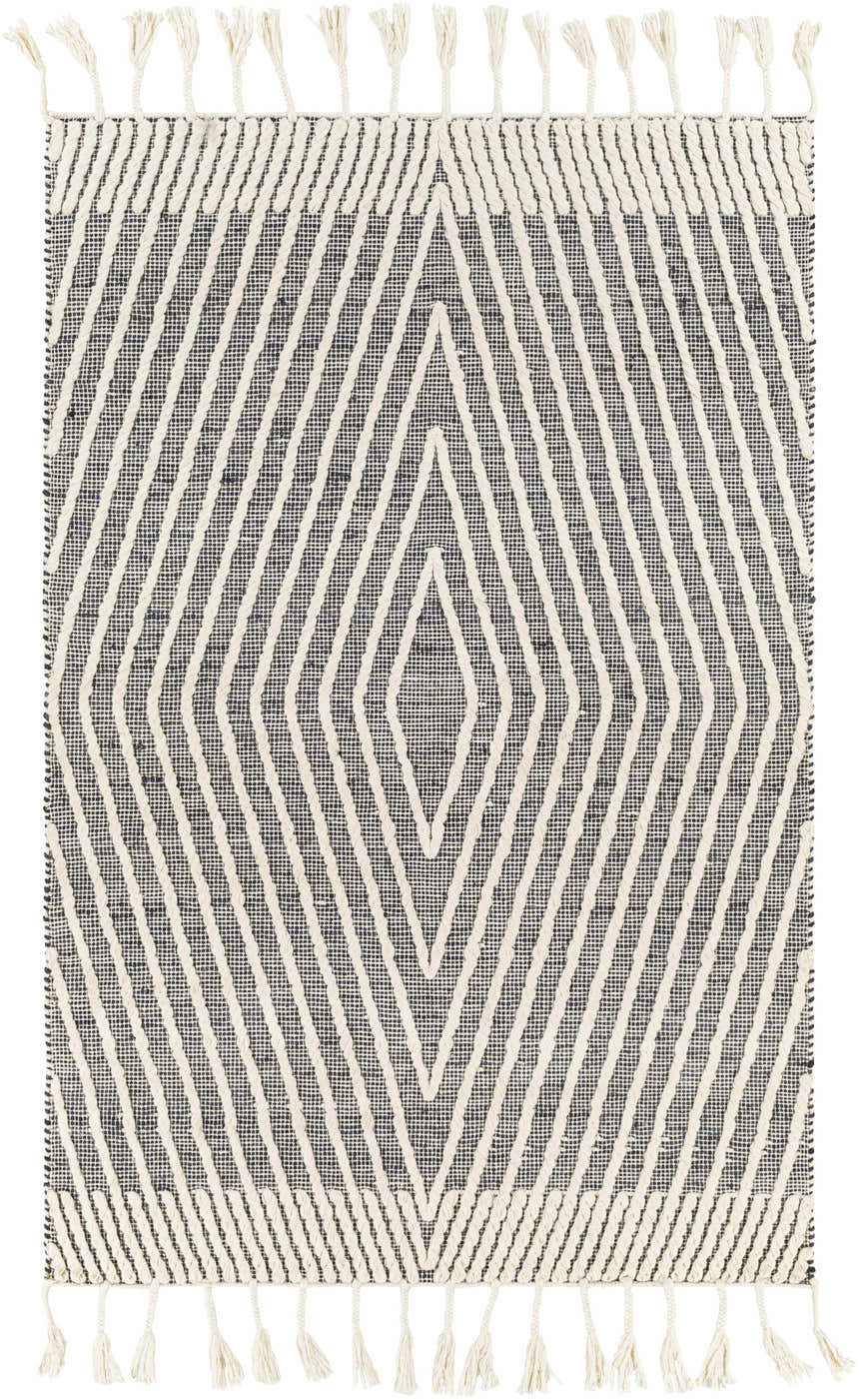 Close-up of Tamayong Tasseled Jute&Wool Rug with a black and cream diamond pattern and tassels. Hand woven rug. Design-Rectangle-576