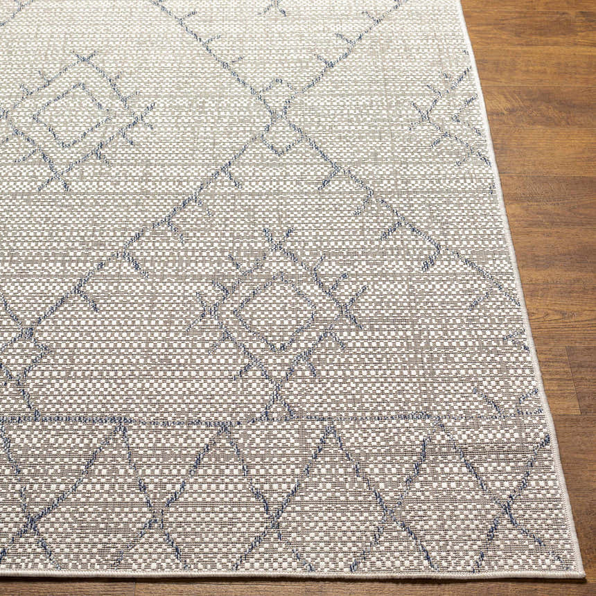 Close-up of the Marwood Gray&Blue Nordic Rug showing its geometric pattern, woven texture, and colors. Front