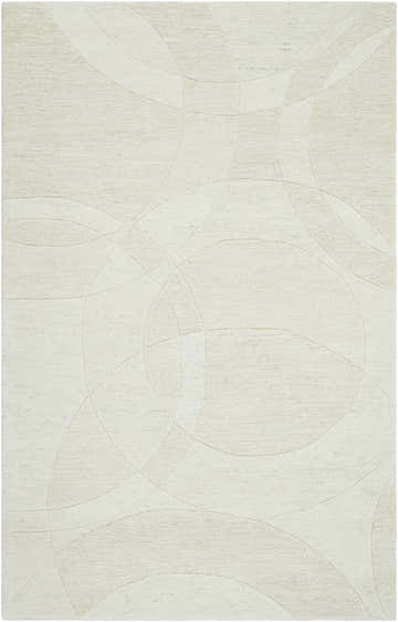 Close-up of the Ville Modern Wool Rug. Light silver rug with a contemporary, abstract circle pattern and hand-tufted texture. Design-Rectangle-58
