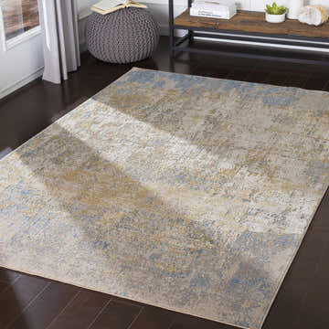 Living room scene with Watersmeet Faux Silk Rug in light blue, brown, mustard, and tan colors. Contemporary style. Roomscene-Rectangle
