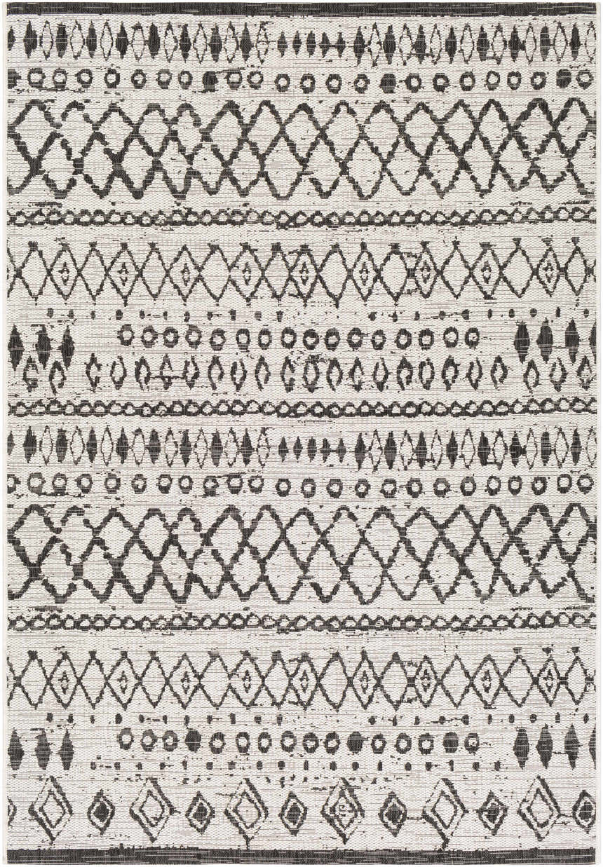 Close-up of the black and white Westside Outdoor Area Rug, featuring a bohemian-inspired geometric pattern. Design-Rectangle-5376