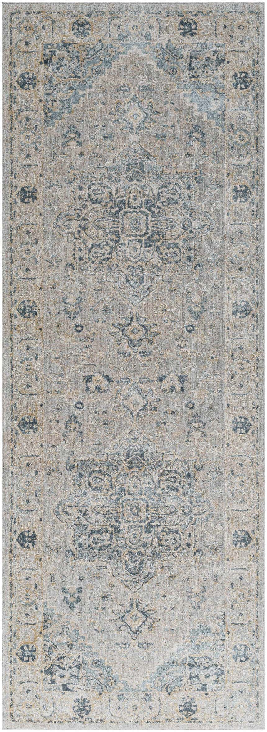 Close-up of the Whangamata Thick Luxe Boutique Rug. Features a traditional pattern in dusty sage, light gray, and pale blue tones. Design-Runner-2773