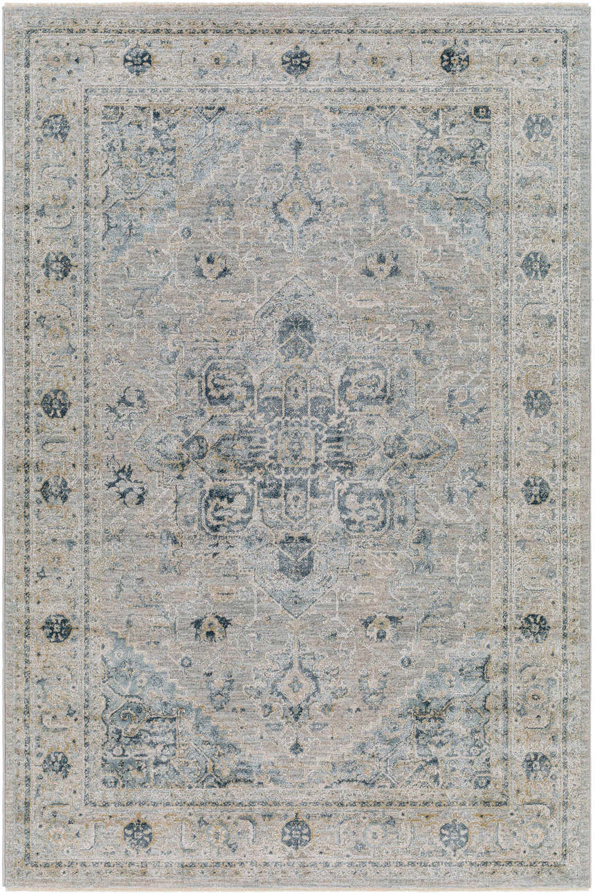 Close-up of the Whangamata Thick Luxe Boutique Rug. Features a traditional design in dusty sage, light gray, and pale blue tones. Design-Rectangle-575