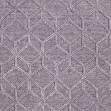 Close-up of the brown Wigtown Carpet showing a geometric cube pattern and hand-loomed texture. Swatch