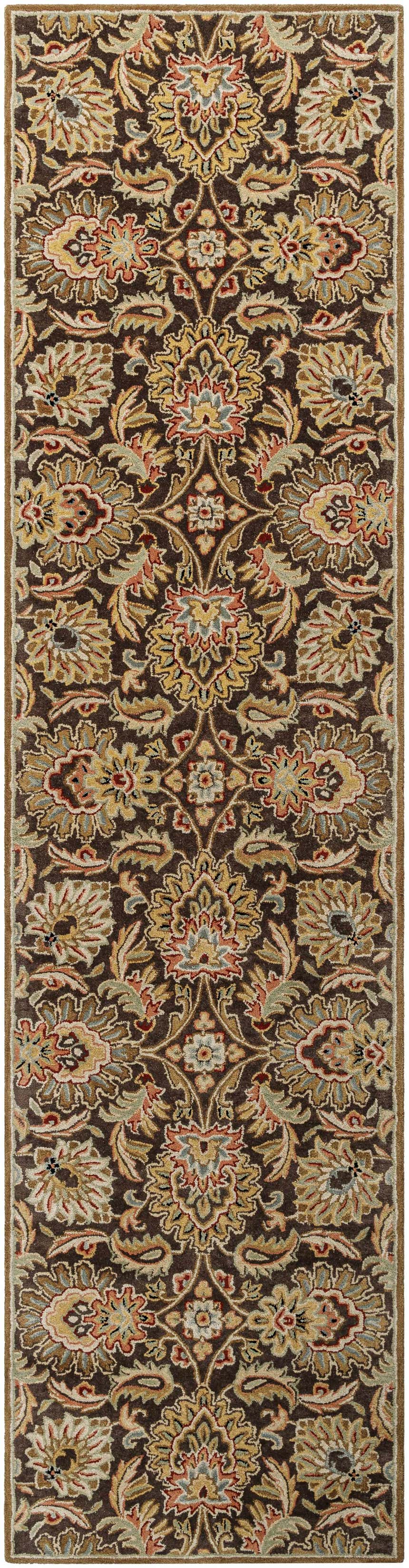 Close-up of the Chesterton 1028 brown wool rug. Features a traditional floral pattern in brown, gold, red, and sage. Hand-tufted texture. Design-Runner-312