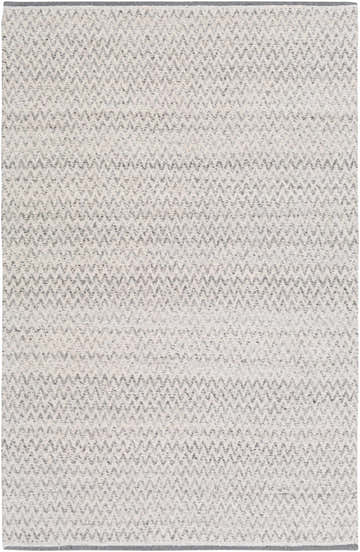 Close-up of the hand woven Wroxall Area Rug. Gray, off white, and slate blue recycled PET yarn in a subtle chevron pattern. Design-Rectangle-576