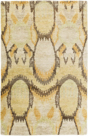 Close-up of Westhoff Jute Area Rug. Beige rug with dark red, mustard, and olive geometric pattern. Hand-knotted texture. Design-Rectangle-58