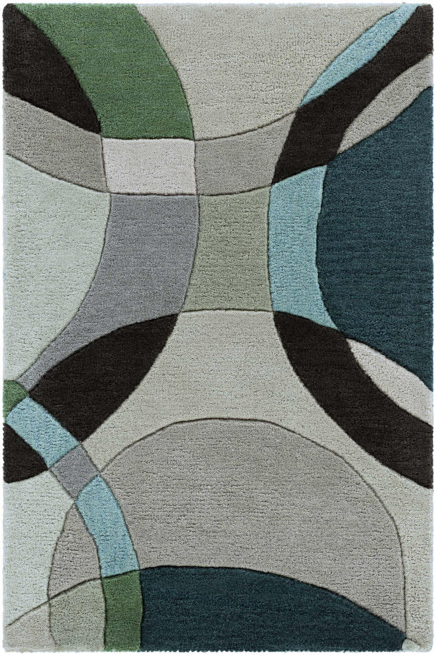 Close-up of the Wyocena Wool Rug, featuring a contemporary geometric design in aqua, black, gray, and green hues. Hand-tufted texture. Design-Rectangle-23