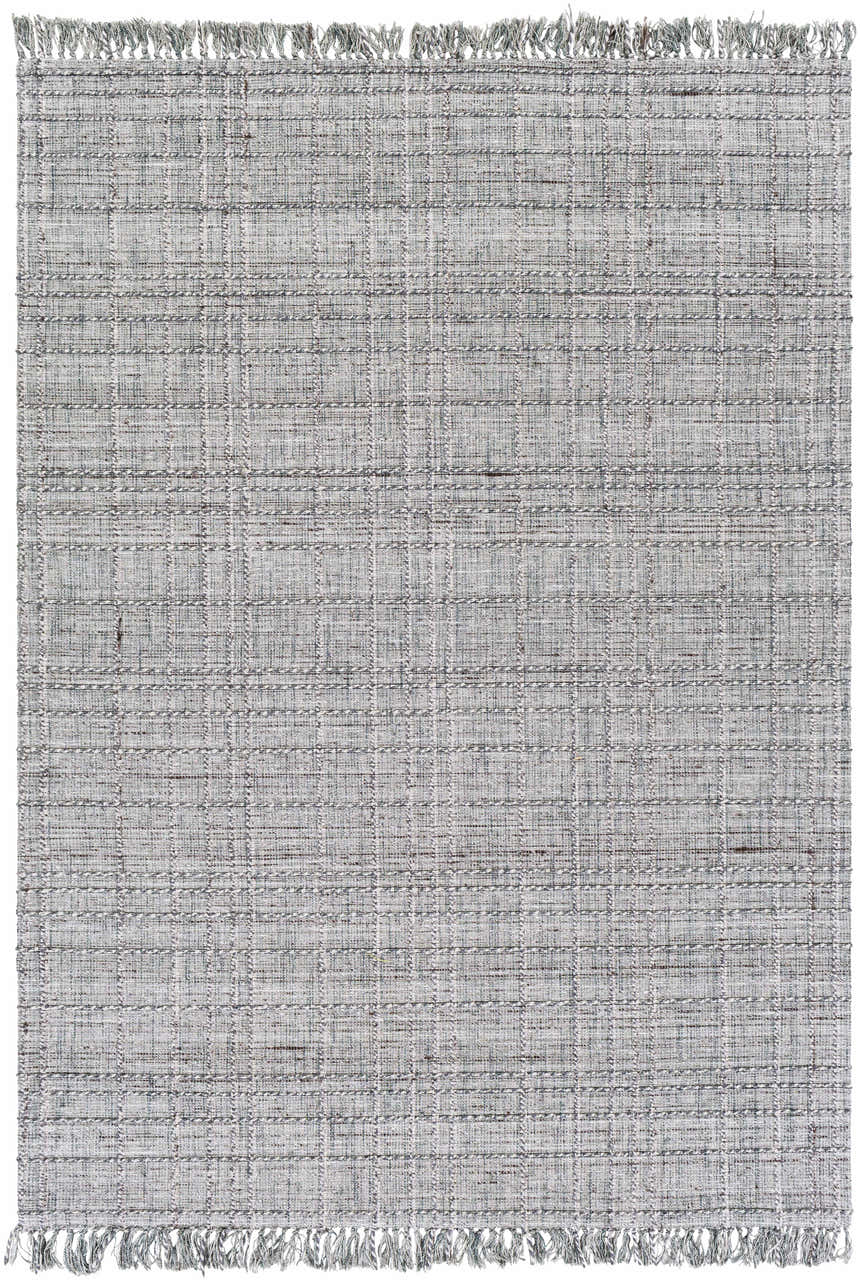 Close-up of the hand-loomed Yatala Area Rug; a contemporary rug in shades of gray, ivory, and brown with fringe detail. Design-Rectangle-576