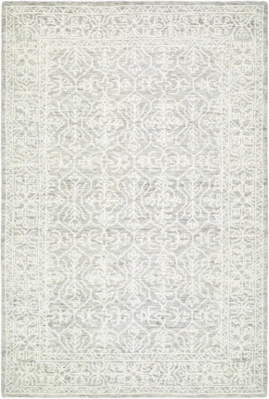 Close-up of Yadid Gray Wool Area Rug. Hand-tufted rug with light silver, off-white, and gray traditional floral pattern. Design-Rectangle-576
