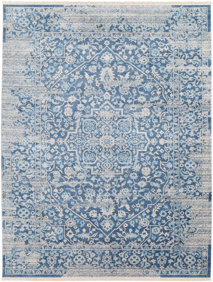 Close-up of the Yorkana Distressed Blue Rug. Features a traditional, vintage-inspired design in blue, gray, and beige tones. Design-Rectangle-710103