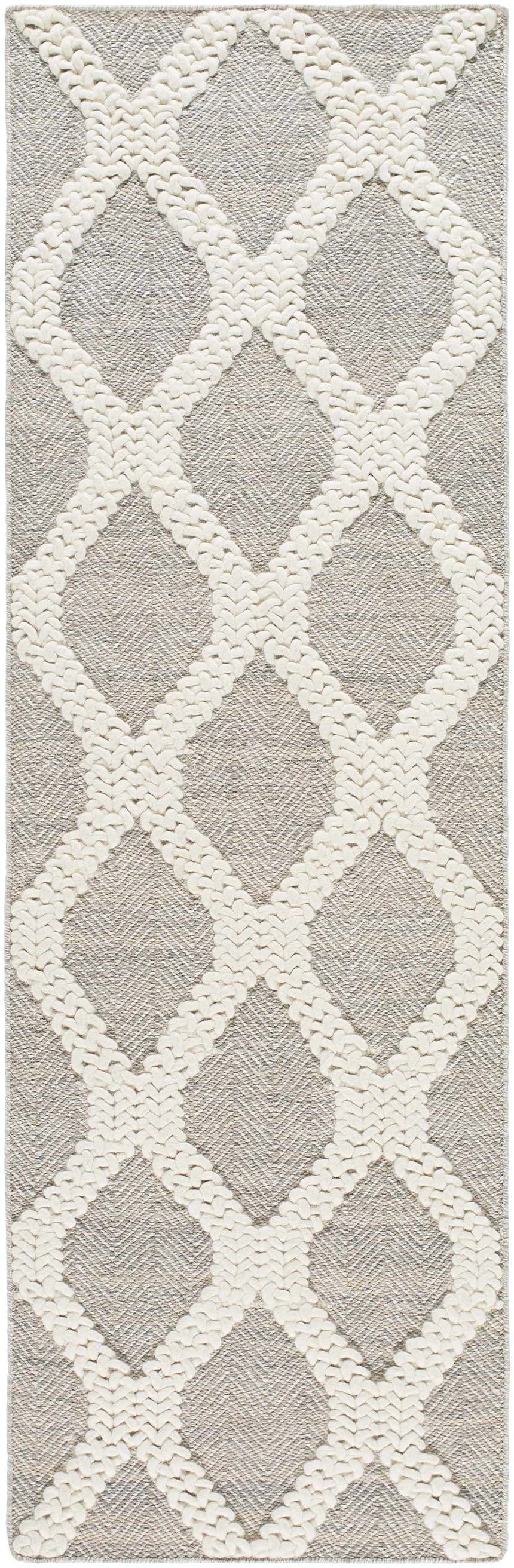 Close-up of the Adora Area Rug. Bone geometric pattern on a cloud gray background. Hand woven texture. Design-Runner-268