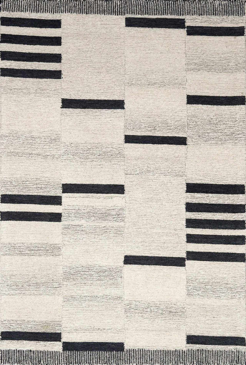 Close-up of the Aibonito Hand Tufted Wool Area Rug. Beige rug with black stripes, contemporary design. Design-Rectangle