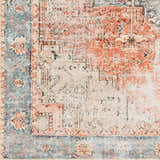 Close up of the Livabliss Amelie AML-2309 rug, showcasing its traditional design, beige, rust, and blue colors. Swatch