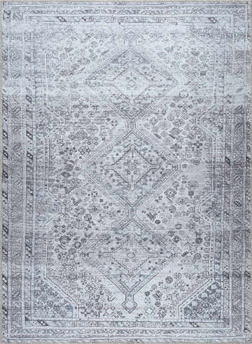 Close-up of the Barny Gray Denim Washable Rug featuring a traditional diamond pattern in charcoal, denim, and off-white tones. Design-Rectangle-5373