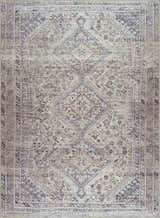 Detailed close-up of the Barny Tan Washable Area Rug. Features a traditional diamond pattern in tan, gray, and slate blue hues. Design-Rectangle-5373
