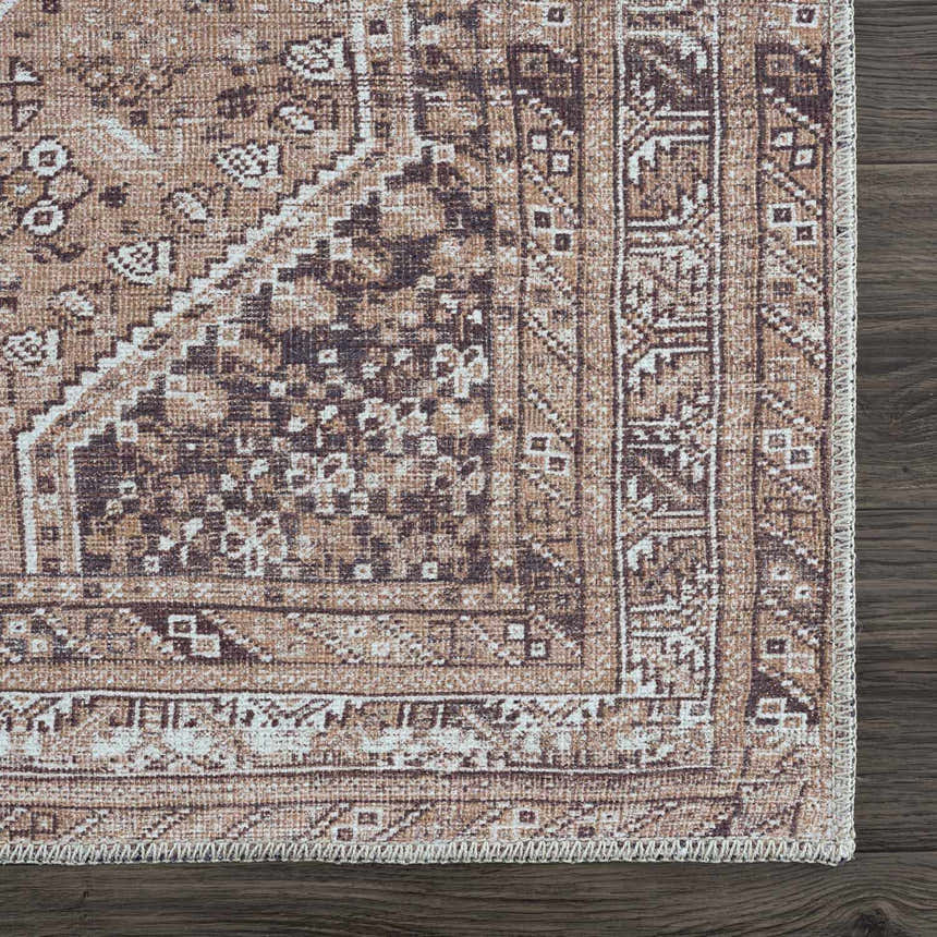 Close up of the Barny Brown flat pile washable rug showing its traditional cream and brown pattern. Swatch