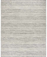 Close-up of the Arabi Wool Area Rug. Hand-woven rug with a striped pattern in black, gray, and light beige. Design-Rectangle