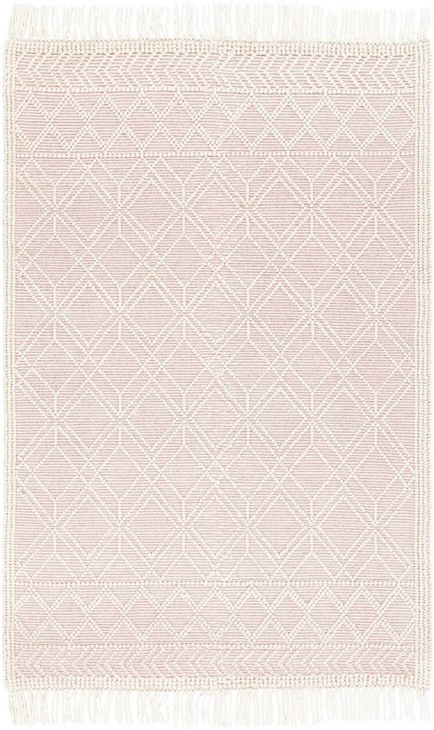 Close-up of the Ramsbury Soft Pink Wool Rug. Features a geometric diamond pattern and fringe detail. Farmhouse style. Design-Rectangle