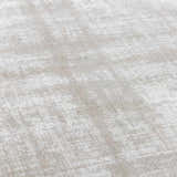 Close-up of the Auchter Soli Taupe rug. The premium sheer carpet has a subtle striped pattern and soft, textured viscose material. Texture