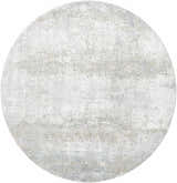 Close-up of a round Avani Thick Luxe Boutique Rug. Features a contemporary abstract pattern in gray, light gray, and nutmeg. Design-Round-67
